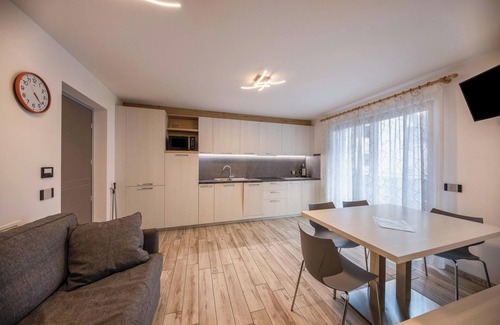 Predazzo Apartment | Comfortable Apartment “Vacanze Arcobaleno - Arancione” with Mountain View