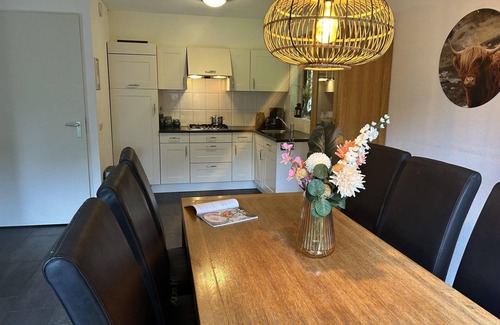 Hooghalen House | Comfortable bungalow with open kitchen, 3 bedrooms, 2 bathrooms, and optional sauna.