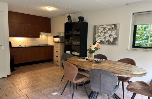 Hooghalen House | Comfortable bungalow with open kitchen, 3 bedrooms, 2 bathrooms, and optional sauna.