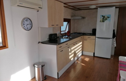 Terwolde Ski Chalet | Comfortable Chalet with spacious terrace and (play) garden facing south.