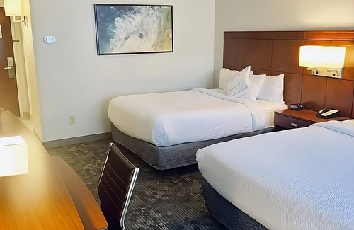 North Myrtle Beach Hotel | Comfortable Coastal Stay Near Barefoot Landing | 3 Rooms with Indoor Pool