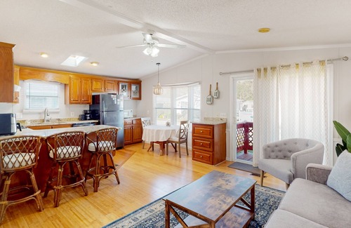 Assateague Pointe House | Comfortable home with tennis court, jetted tub, pool, W/D, patio, & full kitchen
