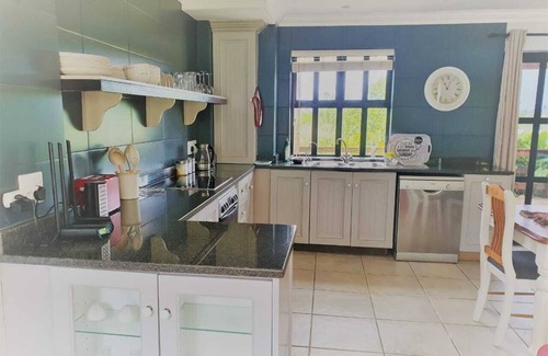 Plettenberg Bay Cottage | Comfortable Large Country Home sleeps 7 with 4 large bedrooms, private garden.