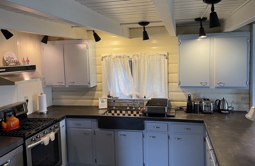Margaretville Cabin | Comfortable Log Cabin With Stunning Views and Park-Like Gardens, Family Friendly