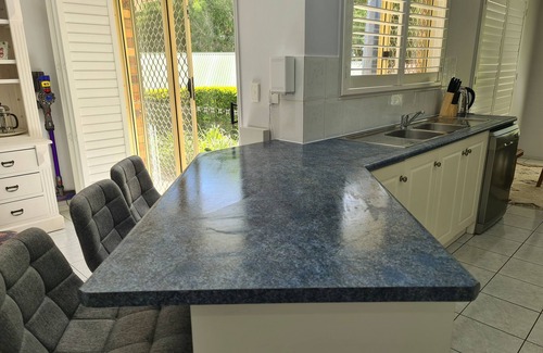 Nudgee House | Comfortable pet friendly family home, 12 min to BNE terminals, 5 to Nudgee Beach