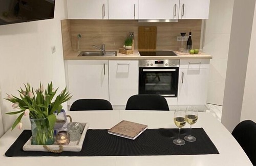Lietzow Apartment | Comfortable vacation apartment with balcony, sauna and Bodden view