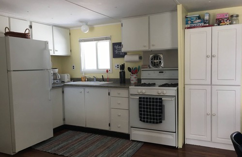 Newaygo Cottage | Comfortable water front cottage with spectacular views and memorable sunsets.