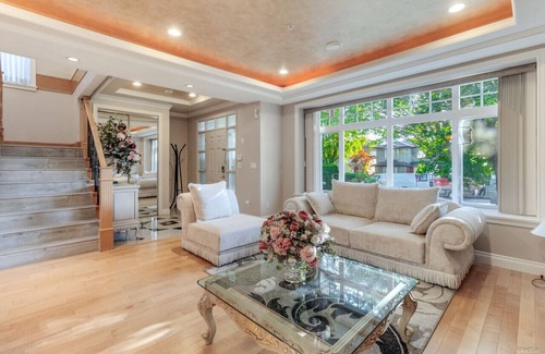 Marpole House | Comfy bedroom with 1/2 bath