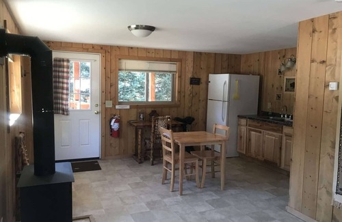 Silver Gate Cabin | Comfy cabin is situated on the Silver Gate property which overlooks 10,000ft tall mountain peaks surrounding the town.