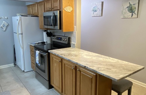 Mary Esther Condo | Comfy Condo with Water Views- Fishing Dock- Sleeps 4
