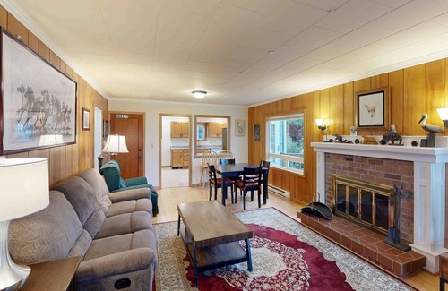 Newport House | Comfy duplex with peekaboo ocean views, private hot tub, & easy beach access
