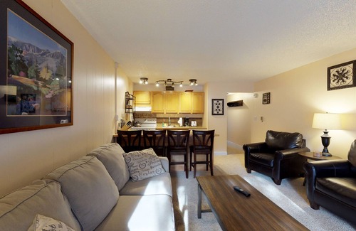 Mountain House Condo | Comfy Riverfront Condo with Pool & Sauna - Walk to Ski Lifts