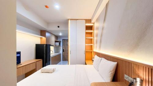 Tetebatu Apartment | Comfy Studio Apartment at Delft Ciputra Makassar By Travelio