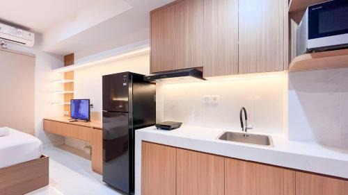 Tetebatu Apartment | Comfy Studio Apartment at Delft Ciputra Makassar By Travelio