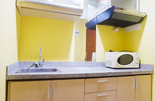 Siwalankerto Apartment | Comfy Studio at High Point Serviced Apartment