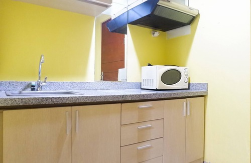 Siwalankerto Apartment | Comfy Studio at High Point Serviced Apartment