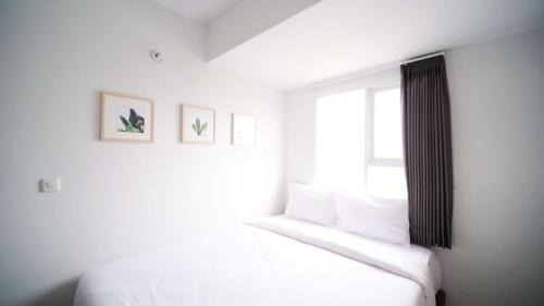 Sidoarjo Apartment | Compact and New 2BR Apartment at Suncity Residence By Travelio