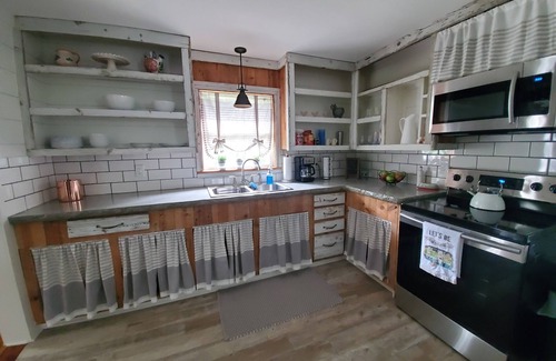 Hot Springs House | Completely remodeled 1940's farmhouse with Gorgeous pond views!