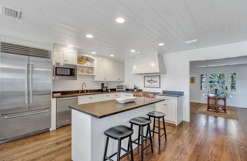 East Beach House | Completely Renovated Ocean Front Home! Easy Walk To BEACH | Heated Pool | Sleeps 12