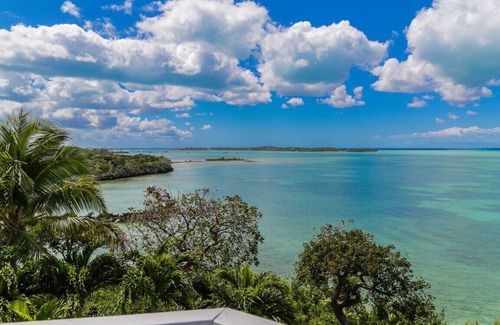 Hope Town House | Conched Out-A 5b/4b luxury home situated on a 2.2 acre estate.