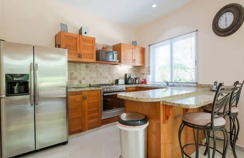Puerto Aventuras Condo | Condo Bellmare B1 Front Water Lagoon 4 steps to the Pool 1 Min.from the beach