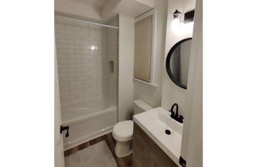 Brantford House | Condo style 2 bed unit on main level with parking