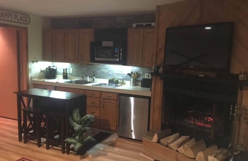Mancelona Condo | Condo that sleeps 8, on golf course w/pool, hot tub and sauna by Torch!