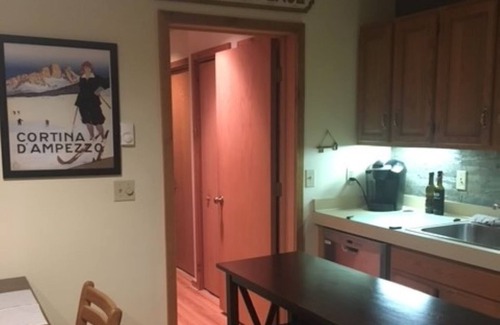 Mancelona Condo | Condo that sleeps 8, on golf course w/pool, hot tub and sauna by Torch!