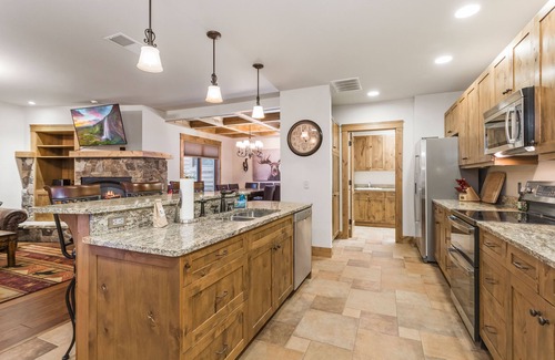Bigfork Condo | Condo w/private boat slip, fireplace, A/C - Marina Cay Estates Lake Daze
