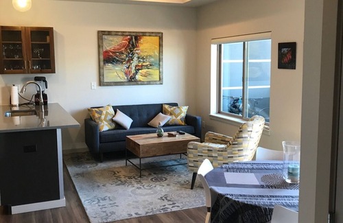 Steel Yards Apartment | Condo with deck facing the mountain, bike path and restaurant across the street, 5 min driving from down town
