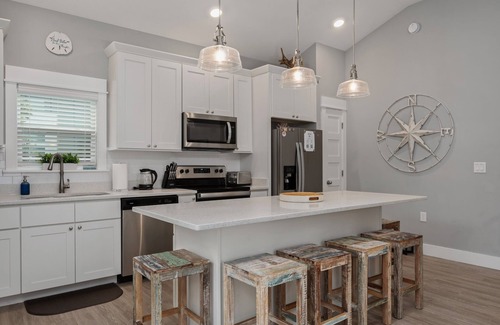 Whalehead Beach House | Condo with Private Hot Tub! Dogs ok! Short walk to beach, comm. Pool