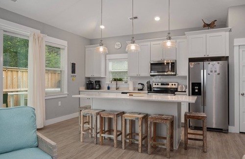 Whalehead Beach House | Condo with Private Hot Tub! Dogs ok! Short walk to beach, comm. Pool