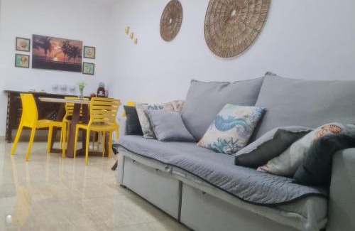 Tombo Apartment | conforto a 2 minutos da praia do tombo com Wi-Fi e garagem Condomínio Parks Garden