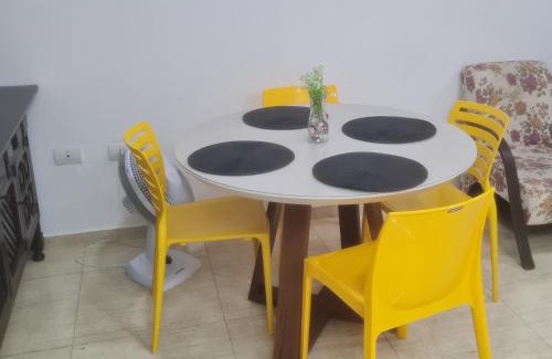 Tombo Apartment | conforto a 2 minutos da praia do tombo com Wi-Fi e garagem Condomínio Parks Garden