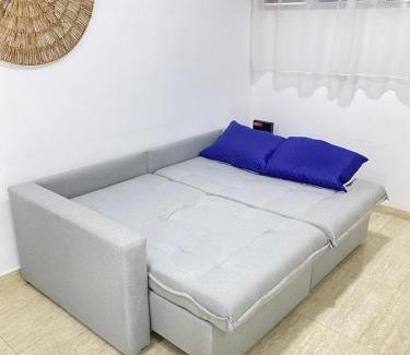 Tombo Apartment | conforto a 2 minutos da praia do tombo com Wi-Fi e garagem Condomínio Parks Garden