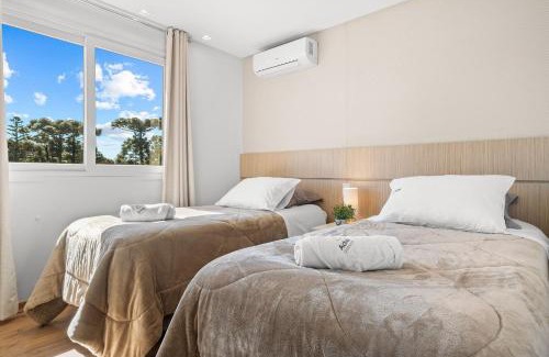 Dutra Apartment | Conforto a 500m do Super Carros by Achei Gramado