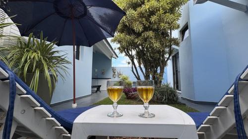 Parque Oasis House | Conforto e Diversão para Toda a Família 50m da Praia - churrasqueira - Sinuca - Jardim - vista lateral para o mar