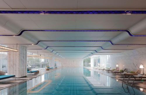 Zhujiang New Town Hotel | Conrad Guangzhou - Free shuttle between hotel and Exhibition Center during Canton Fair & Exhibitor registration Counter