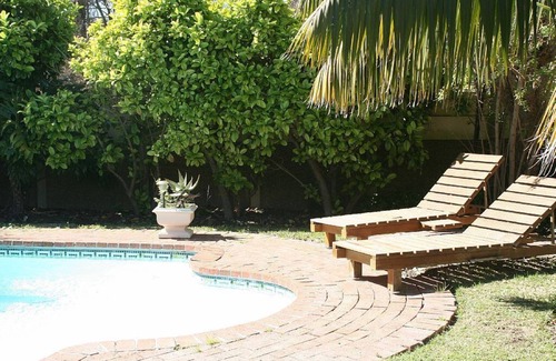 Constantia Cottage | Constantia Lazy River, Froggs Leap studio for 2 people and 2 small kids on sofa