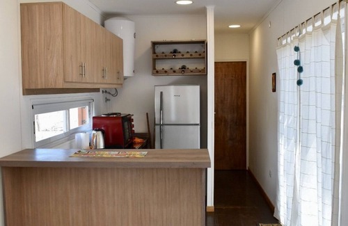Cafayate House | Container House in a Very Quiet Neighborhood Surrounded by old Carob Trees