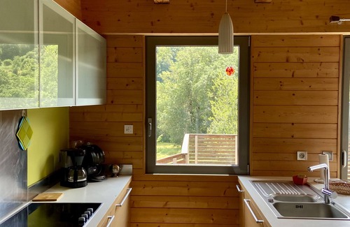 Egliseneuve-d'Entraigues Ski Chalet | Contemporary chalet located in the mountains, on an organic agricultural estate