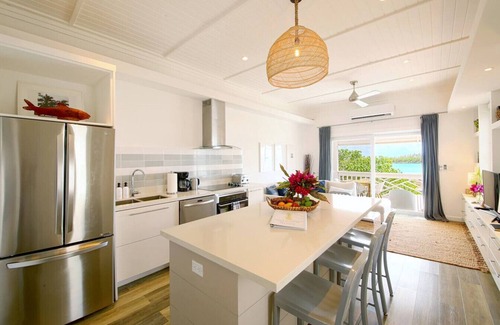 Governor's Harbour Apartment | Contemporary Upstairs 2BR 2BA Bayfront Apartment