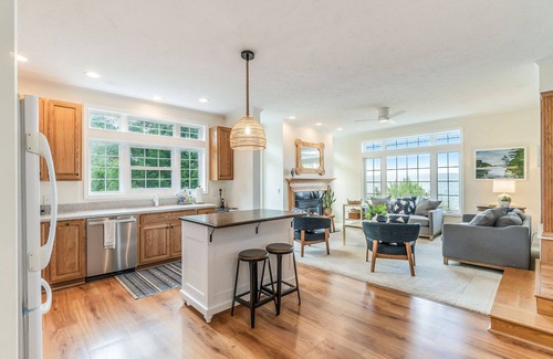 Lake Township Cottage | Contemporary Crystal Lake Beachfront Cottage