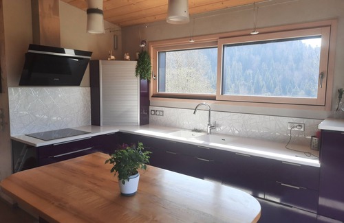 Entre-Deux-Monts House | Contemporary home with jacuzzi overlooking nature