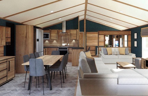 Frampton Ski Chalet | Contemporary lodge with one spacious king-sized bed with en suite.