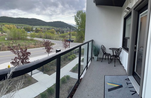 Vernon Condo | Contemporary studio retreat steps to the beach on Okanagan Lake.