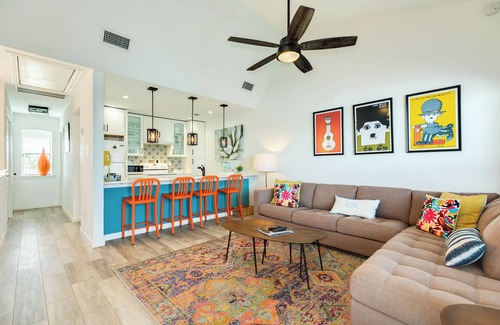 Pirates Cove House | Contemporary Townhome w/Bay View - Cozy Living Area & Gorgeous Sunsets