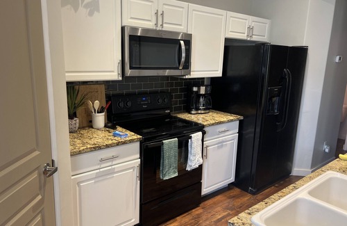 Meridian House | Contemporary Townhome close to shopping and dining.