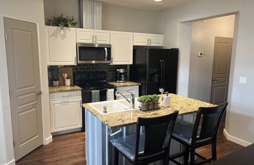 Meridian House | Contemporary Townhome close to shopping and dining.