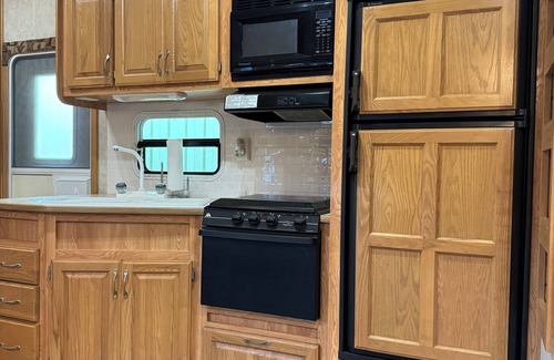 Schoharie RV Rental | Convenient Campsite W/fifth wheel camper, Creek Front.